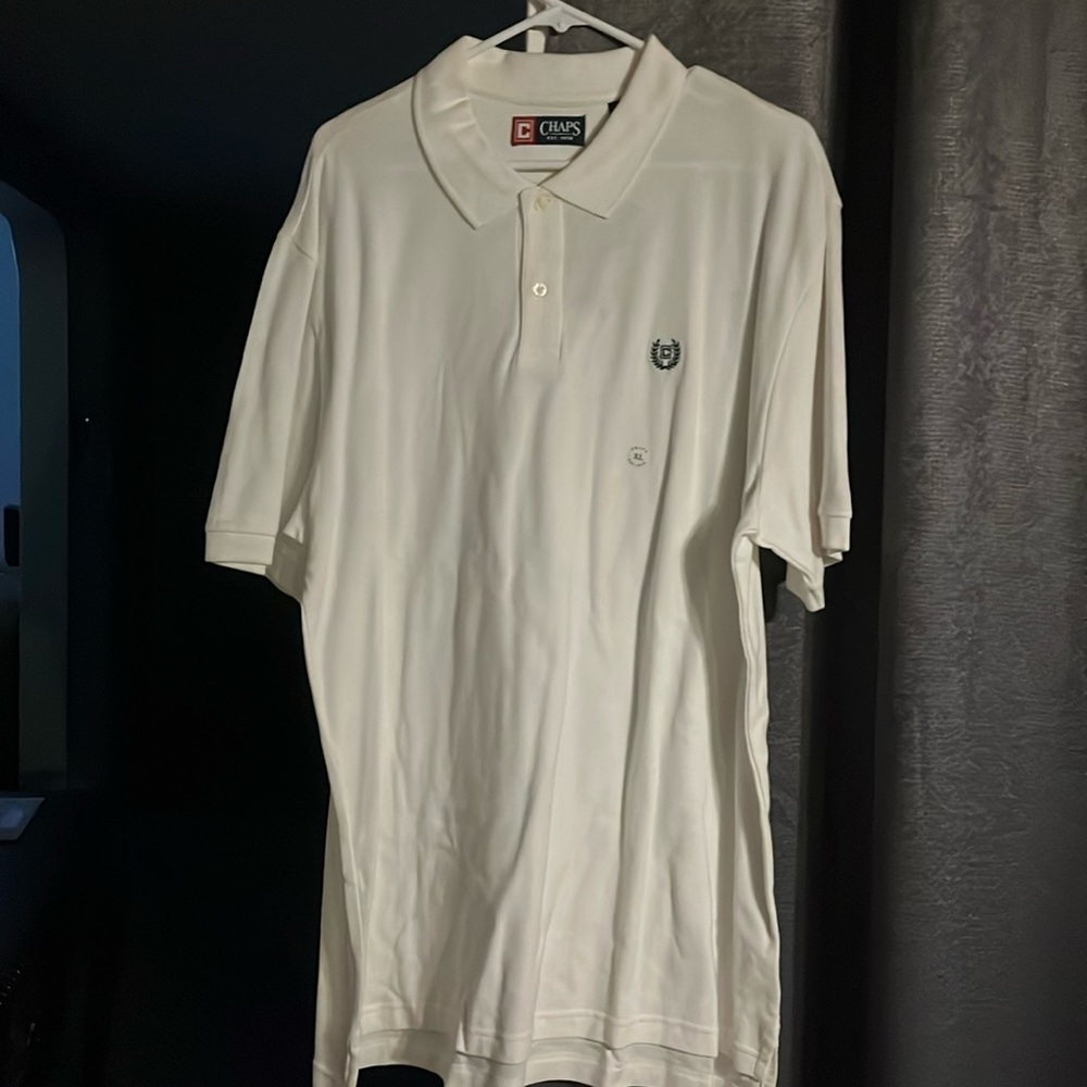 Chaps new shirt been in closet slight mark on button